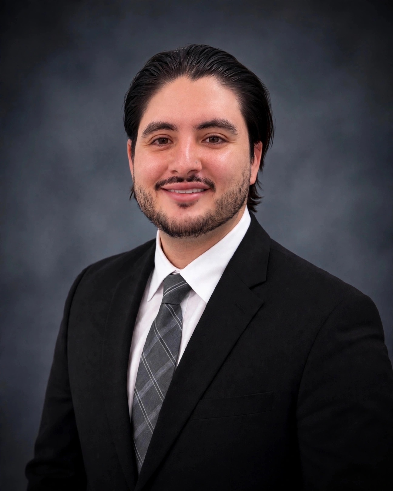 Cristian Martinez, licensed Farmers Insurance agent in his Rocklin office